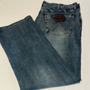 Wrangler Blue Relaxed Fit Jeans with Distressed Style